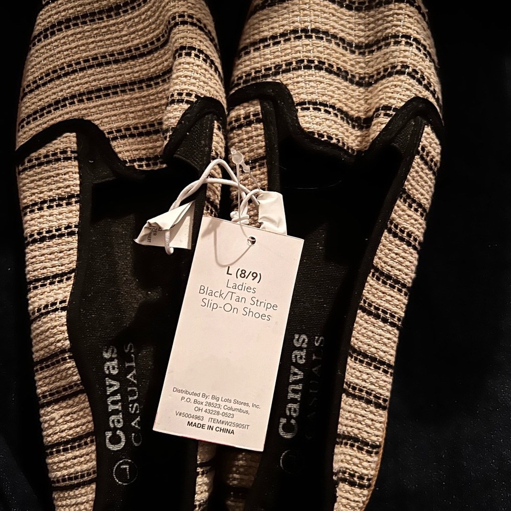 NWT Women’s size L (8/9) Black/Tan slip on shoes  silver sparkle throughout shoe